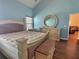 Main bedroom with ample dresser space and large windows at 1734 Spring Hill Cv, Lithonia, GA 30058