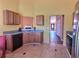 Kitchen offers ample counter space and views into the living room at 1734 Spring Hill Cv, Lithonia, GA 30058