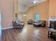 Living room featuring hardwood floors and a fireplace at 1734 Spring Hill Cv, Lithonia, GA 30058