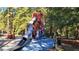 Colorful playground with slides and climbing structures at 1734 Spring Hill Cv, Lithonia, GA 30058