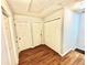 Hallway with doors and wood flooring at 532 Oakside Pl, Acworth, GA 30102