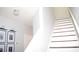 Bright white staircase with dark wood accents at 532 Oakside Pl, Acworth, GA 30102