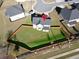 A lovely aerial view of a fenced in back yard and the back of the house at 799 Blue Juniper Cir, Loganville, GA 30052