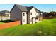 This is an image of the back of the house showing off the backyard and fence at 799 Blue Juniper Cir, Loganville, GA 30052