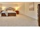 Spacious bedroom featuring a large carpeted area, perfect for relaxation and comfort at 799 Blue Juniper Cir, Loganville, GA 30052