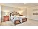 Bright bedroom with a plush carpet, queen bed and neutral decor, creating a calming atmosphere at 799 Blue Juniper Cir, Loganville, GA 30052