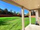 Covered patio overlooking a spacious backyard at 799 Blue Juniper Cir, Loganville, GA 30052