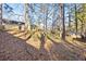 Wooded backyard view of property at 812 Bartow Ct, Riverdale, GA 30274