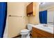 Bathroom with toilet, sink, and shower at 812 Bartow Ct, Riverdale, GA 30274