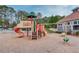 Community playground with a slide and swings, perfect for Gathering fun at 1692 Branch Creek Cv, Lawrenceville, GA 30043