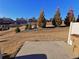 Private backyard patio with hillside and community view at 2452 Pearl Ridge Trce, Buford, GA 30519