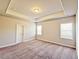 Bright bedroom featuring carpet and neutral walls at 2452 Pearl Ridge Trce, Buford, GA 30519