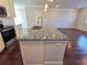 Kitchen island with granite countertop and double sink at 2452 Pearl Ridge Trce, Buford, GA 30519