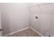 Laundry room with shelving and space for washer and dryer at 2452 Pearl Ridge Trce, Buford, GA 30519