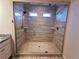 Large walk-in shower with double shower heads at 2452 Pearl Ridge Trce, Buford, GA 30519