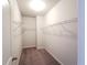 Large walk-in closet with wire shelving at 2452 Pearl Ridge Trce, Buford, GA 30519