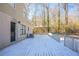 Backyard exterior featuring an elevated deck, brick, and siding at 3049 Flat Shoals Rd, Atlanta, GA 30349