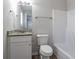 Bathroom featuring a single vanity, toilet, and shower/tub combination at 3049 Flat Shoals Rd, Atlanta, GA 30349