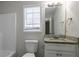 Well-lit bathroom with neutral walls and granite countertop at 3049 Flat Shoals Rd, Atlanta, GA 30349