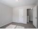 Well-lit bedroom with neutral paint and convenient closet at 3049 Flat Shoals Rd, Atlanta, GA 30349