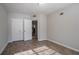 Bedroom with light walls, carpet and a spacious closet at 3049 Flat Shoals Rd, Atlanta, GA 30349