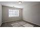 Comfortable bedroom with a window and neutral carpet at 3049 Flat Shoals Rd, Atlanta, GA 30349