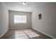 Bright bedroom with hard surface flooring and a window at 3049 Flat Shoals Rd, Atlanta, GA 30349