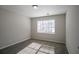 Bright bedroom featuring a large window and soft carpeting at 3049 Flat Shoals Rd, Atlanta, GA 30349