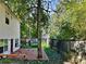 Private backyard with deck and large tree at 4230 Pilgrim Point Rd, Cumming, GA 30041