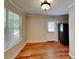 Dining area with hardwood floors and access to the kitchen at 4230 Pilgrim Point Rd, Cumming, GA 30041