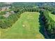 Aerial view of a golf course at 7890 Royal Melbourne Way, Duluth, GA 30097