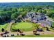 Aerial view of clubhouse and putting green at 7890 Royal Melbourne Way, Duluth, GA 30097