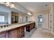 Bathroom with granite countertop and double sinks at 7890 Royal Melbourne Way, Duluth, GA 30097