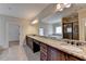 Large bathroom with granite countertops and double sinks at 7890 Royal Melbourne Way, Duluth, GA 30097