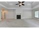 Spacious bedroom with fireplace and high ceilings at 7890 Royal Melbourne Way, Duluth, GA 30097