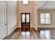 Elegant entryway with double doors and hardwood floors at 7890 Royal Melbourne Way, Duluth, GA 30097