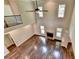 Two-story great room with hardwood floors and fireplace at 7890 Royal Melbourne Way, Duluth, GA 30097