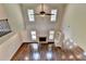 Two-story great room with hardwood floors and fireplace at 7890 Royal Melbourne Way, Duluth, GA 30097