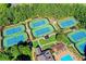 Well-maintained tennis courts in a community at 7890 Royal Melbourne Way, Duluth, GA 30097