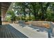 Spacious back deck overlooks a private backyard with mature trees at 1669 Liberty Vly, Decatur, GA 30032