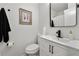 Clean bathroom with updated vanity, toilet and shower/tub combo at 1669 Liberty Vly, Decatur, GA 30032