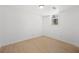 Clean, light-filled bedroom with hardwood floors, white walls, and a window at 2277 Cloverdale Se Dr, Atlanta, GA 30316