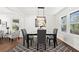 Bright dining room with hardwood floors and modern light fixture at 2277 Cloverdale Se Dr, Atlanta, GA 30316