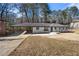 Charming single-story home featuring a long carport and freshly updated landscaping at 2277 Cloverdale Se Dr, Atlanta, GA 30316