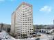 Exterior view of a tall, light beige apartment building at 2479 Peachtree Ne Rd # 802, Atlanta, GA 30305