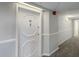 Clean and well-lit hallway with carpeted floors at 2479 Peachtree Ne Rd # 802, Atlanta, GA 30305