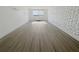 Bright living room with hardwood floors and large window at 2479 Peachtree Ne Rd # 802, Atlanta, GA 30305