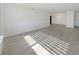 Spacious living room with light wood floors and 3D wall at 2479 Peachtree Ne Rd # 802, Atlanta, GA 30305