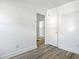 Spacious bedroom with light walls and wood-look flooring at 3845 Springleaf Ct, Stone Mountain, GA 30083