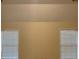 Bedroom with two windows and tan walls at 7981 Gossamer Dr, Fairburn, GA 30213